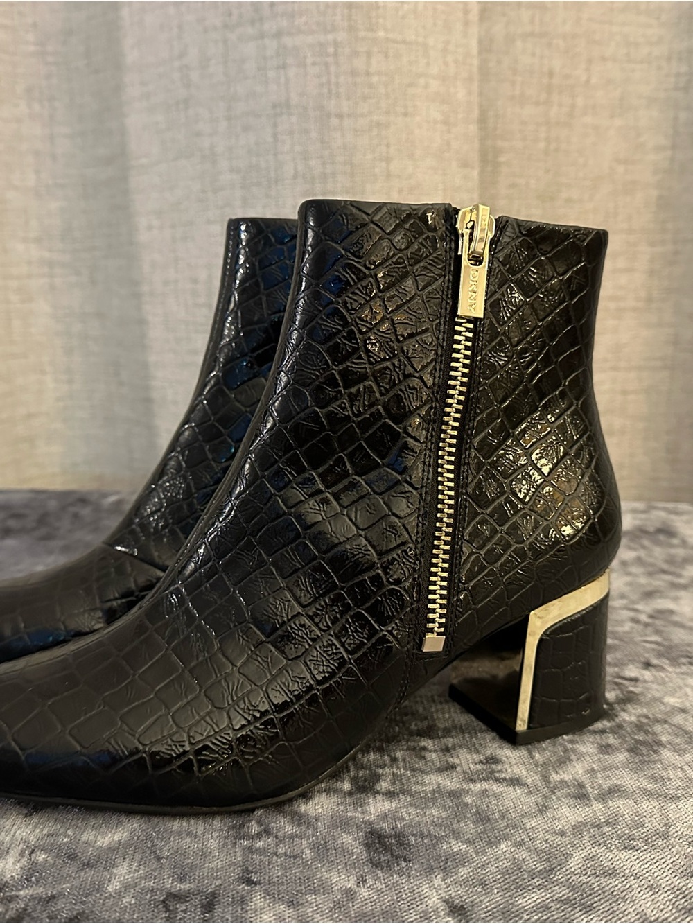 DKNY Black Croc-Embossed Ankle Booties with Gold Zip & Heel Accent